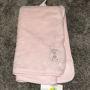 Pink fleece reversible baby blanket